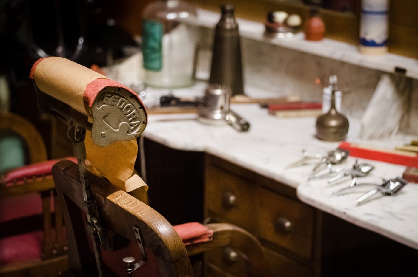 Vintage barber station with clippers and tools on marble